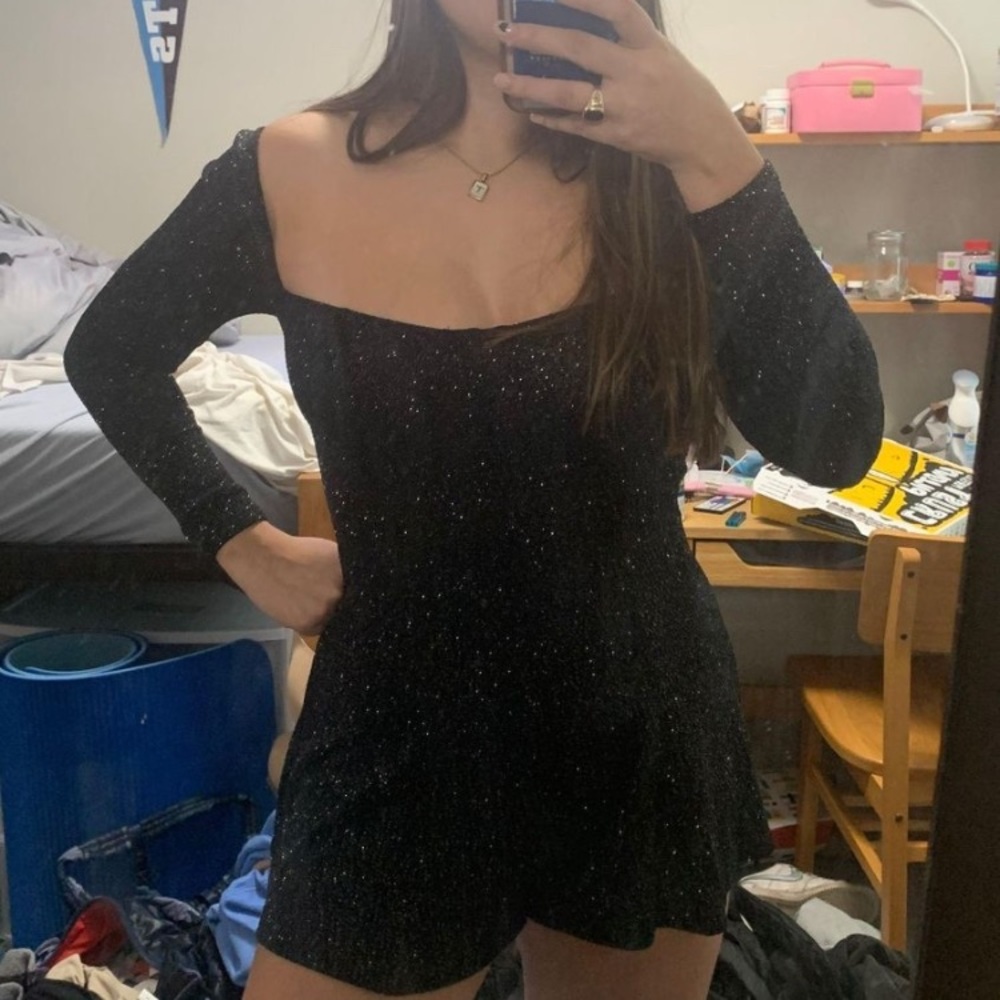 Black sparkly long sleeve romper in a womens size small from Urban Outfitters!